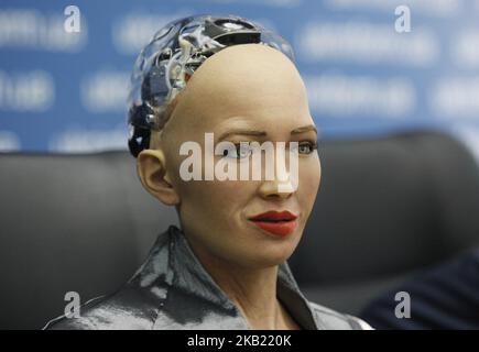 'Sophia the Robot' speaks during a press-conference in Kiev, Ukraine, 11 October, 2018. The humanoid 'Sophia the Robot', developed by Hong Kong-based company Hanson Robotics, visited Ukraine to have a meeting with the Ukrainian PM and for cooperation with State Agency for Electronic Government of Ukraine. The press conference ended with the signing of a Memorandum of Cooperation between State Agency for Electronic Government of Ukraine and Hanson Robotics and AngelVest on the dissemination of the use of AI technologies and robotics in all spheres of life and industry of Ukraine, as well as the Stock Photo