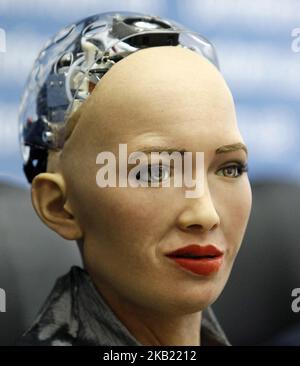 'Sophia the Robot' speaks during a press-conference in Kiev, Ukraine, 11 October, 2018. The humanoid 'Sophia the Robot', developed by Hong Kong-based company Hanson Robotics, visited Ukraine to have a meeting with the Ukrainian PM and for cooperation with State Agency for Electronic Government of Ukraine. The press conference ended with the signing of a Memorandum of Cooperation between State Agency for Electronic Government of Ukraine and Hanson Robotics and AngelVest on the dissemination of the use of AI technologies and robotics in all spheres of life and industry of Ukraine, as well as the Stock Photo