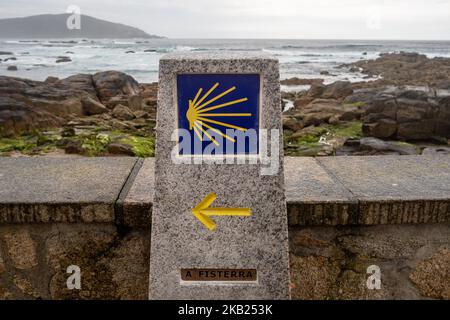 May-June 2018, Spain. The Camino de Santiago (the Way of St. James) is a large network of ancient pilgrim routes stretching across Europe and coming together at the tomb of St. James (Santiago in Spanish) in Santiago de Compostela in north-west Spain. Finisterre (Fisterra in Galician) was both the end of the known world until Columbus altered things and the final destination of many of the pilgrims who made the journey to Santiago in past centuries. Pilgrims in past centuries also continued northwards up the coast to the Santuario de Nuestra Señora de la Barca in Muxía, 29km north of the “end  Stock Photo