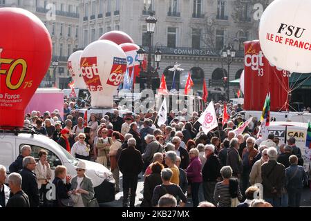 Protesters march near the Opera House during a demonstration called by pensioners' unions on October 18, 2018 in Paris, to demand pensions' increase and protest against the French government policy. (Photo by Michel Stoupak/NurPhoto) Stock Photo