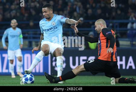 Manchester City's Gabriel Jesus, left, and Shakhtar's Yaroslav Rakitskiy, right, in the fight for the ball during of the Champions League group stage match between Shakhtar Donetsk and Manchester City at Metalist Stadium in Kharkov. Ukraine, Tuesday, October 23, 2018 (Photo by Danil Shamkin/NurPhoto) Stock Photo