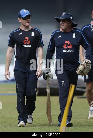 England cricket captain Eoin Morgan (L) and head coach Trevor Bayliss discuss during a net practice session ahead of the only Twenty-20 cricket match between Sri Lankan and England at R Premadasa International Cricket ground, Colombo, Sri Lanka.10-26-2018 (Photo by Tharaka Basnayaka/NurPhoto) Stock Photo