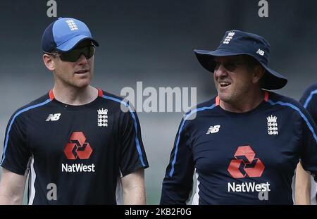 England cricket captain Eoin Morgan (L) and head coach Trevor Bayliss discuss during a net practice session ahead of the only Twenty-20 cricket match between Sri Lankan and England at R Premadasa International Cricket ground, Colombo, Sri Lanka.10-26-2018 (Photo by Tharaka Basnayaka/NurPhoto) Stock Photo