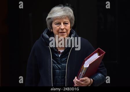 British Prime Minister Theresa May leaves 10 Downing Street as she makes her way to the Parliament to attend Prime Minister Questions session (PMQs), before heading to Brussels, on November 21, 2018 in London, UK. Mrs May is set to meet President of the European Commission, Jean Claude Junker, to finalize Brexit deal. (Photo by Alberto Pezzali/NurPhoto) Stock Photo