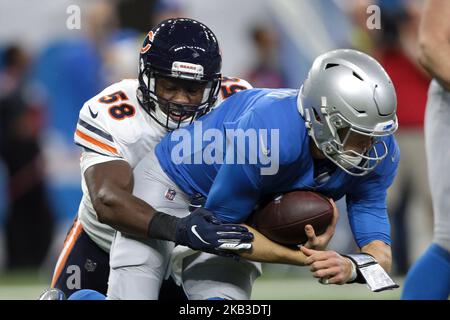 Detroit Lions quarterback Matthew Stafford (9) is tackled by Chicago Bears inside linebacker Roquan Smith (58) during the first half of an NFL football game in Detroit, Michigan USA, on Thursday, November 22, 2018. (Photo by Jorge Lemus/NurPhoto) Stock Photo