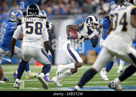 Rapper YG wears the jersey of Los Angeles Rams wide receiver Robert Woods  during the second half of an NFL football game against the Detroit Lions  Sunday, Oct. 24, 2021, in Inglewood