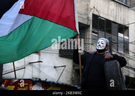 Palestinians demonstrate against a US-drafted resolution that would condemn Palestinian resistance movement Hamas for firing rockets in Gaza city on December 5, 2018. (Photo by Majdi Fathi/NurPhoto) Stock Photo