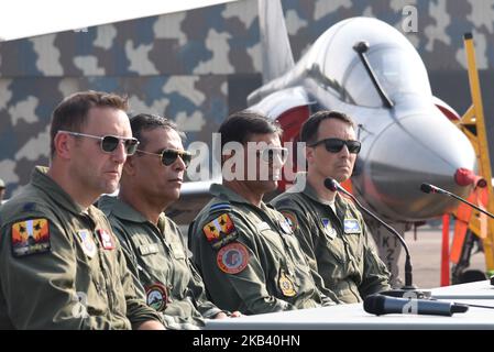 Air Commodore J. S. Mann, second left, Exercise Director, Indian Air Force, flanked by Col Darryl Insley, left, Exercise Director, US Air Force, Air Commodore Saji Antony, second right, Air Officer Commanding, Kalaikunda, and Lieutenant Col John Delison, right Commanding Officer, 67 Fighter Squadron, US Air Force attend a media interaction during Indian Air Force and US Air Force bilateral joint Exercise Cope India 2018 at Air Force Station Kalaikunda on December 10,2018 in West Bengal,India. US F-15 fighter aircrafts , moving C-130 transport aircraft, Hawk aircraft , Sukhoi-30 aircrafts part  Stock Photo