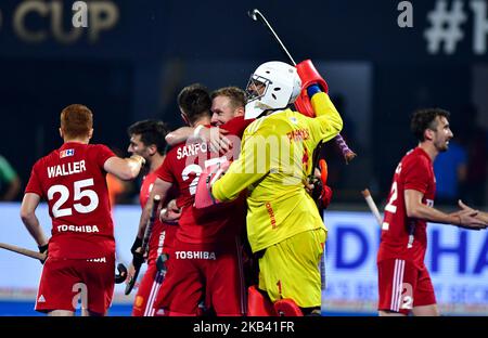 Goalkeeper George Pinner (yellow) celebrates victory at full time during the FIH Men's Hockey World Cup quarter final match between Argentina and England at Kalinga Stadium on December 12, 2018 in Bhubaneswar, India. (Photo by NurPhoto) (Photo by NurPhoto) Stock Photo