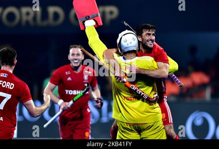 Goalkeeper George Pinner (yellow) celebrates victory at full time during the FIH Men's Hockey World Cup quarter final match between Argentina and England at Kalinga Stadium on December 12, 2018 in Bhubaneswar, India. (Photo by STR/NurPhoto) Stock Photo