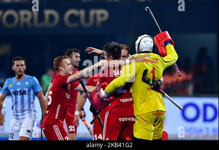 Goalkeeper George Pinner (yellow) celebrates victory at full time during the FIH Men's Hockey World Cup quarter final match between Argentina and England at Kalinga Stadium on December 12, 2018 in Bhubaneswar, India. (Photo by NurPhoto) Stock Photo