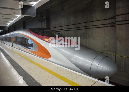 Vibrant Express train, operated by MTR Corp is shown inside West Kowloon Station in Hong Kong, China. 13 December 2018. Today A Hong Kong court ruled that a controversial arrangement (co-location) which allows mainland Chinese officers to apply national laws at the city’s new cross-border rail terminus is legally sound, The Guangzhou-Shenzhen-Hong Kong Express Rail Link (XLR) which cost (US$10.8 billion ) went into operation on September 23.early this year. (Photo by Harry Wai/NurPhoto) Stock Photo