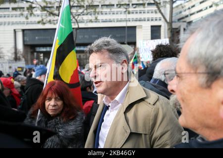 The new French communist party national secretary Fabien Roussel (C) takes part in a demonstration of pensionners in front of the Ministry of Finance in Paris on December 18, 2018, to defend their purchasing power and despite the abandonment of the project to increase fuel taxes and announcements by Emmanuel Macron (revaluation of the activity bonus for employees at the SMIC, tax exemption for overtime, cancellation of the increase in the CSG for pensioners receiving a pension of less than 2,000 € per month). (Photo by Michel Stoupak/NurPhoto) Stock Photo