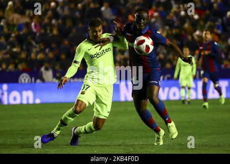 Jeison Murillo of FC Barcelona (L) in action against Levante's forward Emmanuel Boateng during spanish King Cup match between Levante UD v FC Barcelona at Ciutat de Valencia Stadium on January 10, 2018 in Valencia, Spain. (Photo by Jose Miguel Fernandez/NurPhoto) (Photo by Jose Miguel Fernandez/NurPhoto) Stock Photo