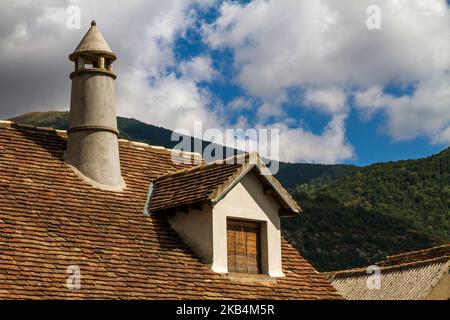 Old style Roof of house with chimney Stock Photo