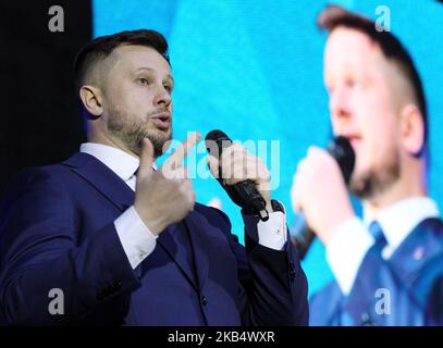 Andriy Biletsky, the leader of the National Corps Ukrainian nationalists party, (C) speaks during a solemn convention of the National Corps party in Kiev, Ukraine, 25 January, 2019. Andriy Biletsky declared that he would not take part in the presidential elections on March 31, but the National Corps party would take part in the parliamentary elections to be held in the autumn of 2019. (Photo by NurPhoto) Stock Photo