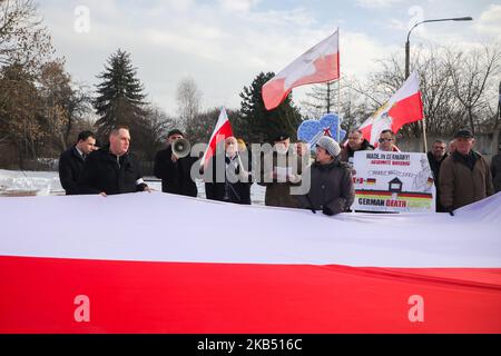 Far-right activists and nationalistic groups march through the streets of Osiwecim city to Auschwitz concentraation camp during the 74th anniversary of the liberation of the Nazi death camp. Oswiecim, Poland on 27 January, 2019. The organizers of the march accuse of remembering only Jews and not murdered Poles in Auschwitz. (Photo by Beata Zawrzel/NurPhoto) Stock Photo