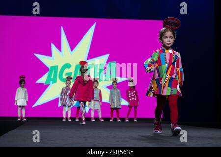 Models walk the runway at the fashion show during the FIMI (Feria Internacional de Moda Infantil y Juvenil) Kids Fashion Week on June 22, 2018 in Madrid, Spain. (Photo by Oscar Gonzalez/NurPhoto) Stock Photo