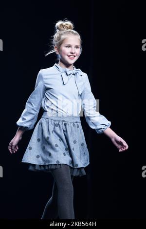 Models walk the runway at the fashion show during the FIMI (Feria Internacional de Moda Infantil y Juvenil) Kids Fashion Week on June 22, 2018 in Madrid, Spain. (Photo by Oscar Gonzalez/NurPhoto) Stock Photo