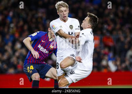 Valencia CF midfielder Daniel Wass (18) and Valencia CF midfielder Denis Cheryshev (11) during the match FC Barcelona against CD Valencia CF, for the round 22 of the Liga Santander, played at Camp Nou on February 2, 2019 in Barcelona, Spain. (Photo by Urbanandsport/NurPhoto) Stock Photo