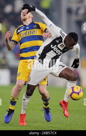 Blaise Matuidi #14 of Juventus FC competes for the ball with Jurij Kucka  #87 of Parma Calcio 1913 during the serie A match between Juventus FC and  Parma Calcio 1913 at Allianz Stadium on February 2, 2019 in Turin, Italy.  (Photo by Giuseppe Cottini ...