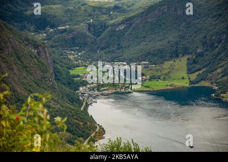 High aerial like - panorama view from Ornesvingen eagle Road observation viewpoint deck of Geirangerfjord Fjord and Geiranger village in Sunnmore region of More og Romsdal county, Storfjorden, Norway on 1st September 2019. The area of the West Norwegian Fjords is inscribed in the list of UNESCO as a World Heritage Site since 2005. The fjord is one of Norway's most visited tourist sites, Geiranger is a branch off of the Sunnylvsfjorden, which is a branch off of the Storfjorden (Great Fjord), part of the steep Trollstigen mountain road . (Photo by Nicolas Economou/NurPhoto) Stock Photo