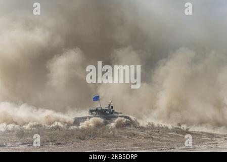 The tactical training for the tank forces of the Ukrainian Army performs at the proving grounds in Honcharivske, Chernihiv Oblast, Ukraine, on September 7, 2019. During the technical demonstration of the tanks, the units were firing with live ammunition and showed the practical use of the anti-tank missiles. Based on the training results, the best tank units were awarded the trophies and the diplomas. (Photo by Oleksandr Rupeta/NurPhoto) Stock Photo