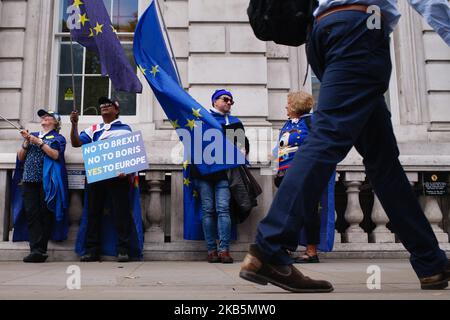 Anti-Brexit activists demonstrate outside the Cabinet Office on Whitehall in London, England, on September 10, 2019. MPs last night voted for a second time to deny Prime Minister Boris Johnson a general election before Britain's scheduled departure from the European Union on October 31. Speaking ahead of the vote, the prime minister insisted that he would not ask the EU for any further extension to Brexit, leaving him now with few options but to either resign or to successfully negotiate a withdrawal agreement acceptable to parliament in the coming weeks. The Johnson government have been accus Stock Photo