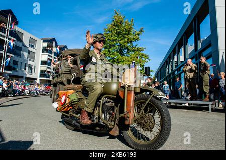 September 14th, Veghel. In 2019 is commemorating 75 years since Operation Market Garden took place. Operation Market Garden was one of the largest Allied operations of the Second World War. It took place on September 1944. At the time, the Allied Forces traveled from Belgium through several locations in the Netherlands, to finally end up in Nijmegen and Arnhem. The event started in the Belgian town of Leopoldsburg on September 14th. A military vehicle parade with around 600 army vehicles from the Second World War drove to Veghel in the Netherlands. (Photo by Romy Arroyo Fernandez/NurPhoto) Stock Photo