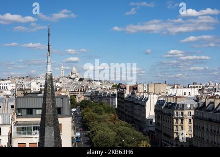 Paris, France, August 29, 2019. A view of the Sacred Heart from the 17th arrondissement on Boulevard des Batignolles. (Photo by Emeric Fohlen/NurPhoto) Stock Photo