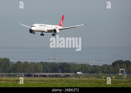 Turkish Airlines Boeing 787-9 Dreamliner aircraft arriving, seen on final approach, touch down on the runway, landing at Amsterdam Schiphol International Airport AMS EHAM in the Netherlands. The modern and advanced wide-body airplane has the registration TC-LLB, 2x GEnx-1B jet engine and is the airline 's newest addition and type. The airplane is flying since July 2019. TK THY connects the Dutch capital with Turkey new Istanbul IST LTFM airport and Istanbul Sabiha Gökçen SAW. TK is the flag carrier of Turkey and the largest carrier in the world by destinations, member of Star Alliance aviation Stock Photo