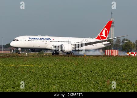 Turkish Airlines Boeing 787-9 Dreamliner aircraft arriving, seen on final approach, touch down on the runway, landing at Amsterdam Schiphol International Airport AMS EHAM in the Netherlands. The modern and advanced wide-body airplane has the registration TC-LLB, 2x GEnx-1B jet engine and is the airline 's newest addition and type. The airplane is flying since July 2019. TK THY connects the Dutch capital with Turkey new Istanbul IST LTFM airport and Istanbul Sabiha Gökçen SAW. TK is the flag carrier of Turkey and the largest carrier in the world by destinations, member of Star Alliance aviation Stock Photo