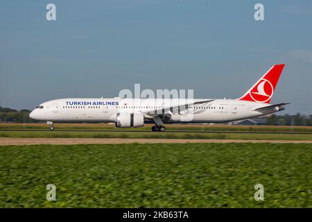 Turkish Airlines Boeing 787-9 Dreamliner aircraft arriving, seen on final approach, touch down on the runway, landing at Amsterdam Schiphol International Airport AMS EHAM in the Netherlands. The modern and advanced wide-body airplane has the registration TC-LLB, 2x GEnx-1B jet engine and is the airline 's newest addition and type. The airplane is flying since July 2019. TK THY connects the Dutch capital with Turkey new Istanbul IST LTFM airport and Istanbul Sabiha Gökçen SAW. TK is the flag carrier of Turkey and the largest carrier in the world by destinations, member of Star Alliance aviation Stock Photo