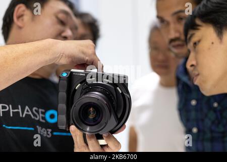 Participants test and try the newly launched Phase One XT camera during a launch event in Kuala Lumpur, Malaysia on September 18, 2019. (Photo by Chris Jung/NurPhoto) Stock Photo