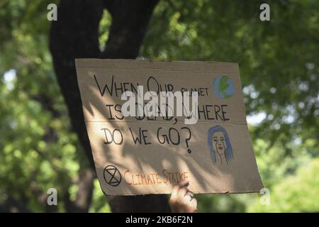 Students and activists hold placards as they participate in a Global Climate Strike rally organised by 'Fridays for Future' in New Delhi, India on September 20, 2019. (Photo by Indraneel Chowdhury/NurPhoto) Stock Photo