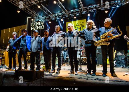 The famous Dire Straits Legacy band in concert in Molfetta at the Puglia Outlet Village on September 21st 2019. The band formed by historical components, Alan Clark (keyboards, hammond and choirs), Jack Sonni & Phil Palmer (guitars & vocals), together with Trevor Horn (bass) Andy Treacy (drums), Andy Hamilton (Sax), plus the Italians Marco Caviglia (vocals and guitar) and Primiano DiBiase (keyboards). (Photo by Davide Pischettola/NurPhoto) Stock Photo