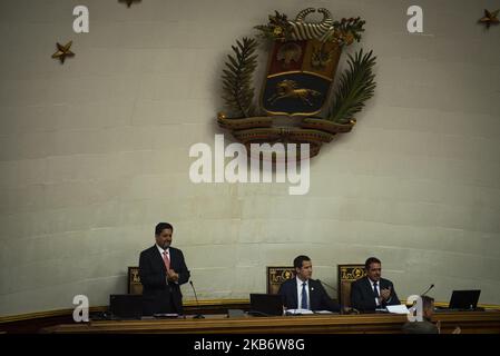 Venezuelan opposition leader and self-proclaimed acting president Juan Guaido (C), National Assembly's vice-president Edgar Zambrano (L) and National Assembly's second vice-president Stalin Gonzalez attend a session at the National Assembly in Caracas on September 24, 2019. Key opposition figure Edgar Zambrano was released from jail last September 17, after his dramatic arrest by intelligence agents for supporting a failed April 30 uprising organized by opposition leader Juan Guaido. (Photo by Jonathan Lanza/NurPhoto) Stock Photo