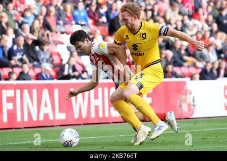 Sunderland's Luke O'Nien competes for the ball with Milton Keynes Dons' Dean Lewington during the Sky Bet League 1 match between Sunderland and MK Dons at the Stadium Of Light, Sunderland, England on Saturday 28th September 2019. (Photo by Steven Hadlow/MI News/NurPhoto) Stock Photo