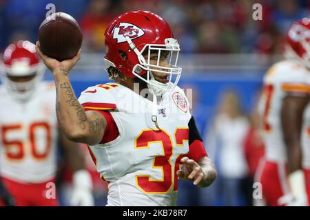 Raiders tight end Darren Waller (83) is tackled by Kansas City Chiefs free  safety Tyrann Mathie …