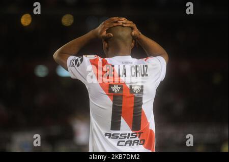 Nicolas De La Cruz of River Plate, left, looks as Walter Bou of Velez  Sarsfield heads the ball during a Copa Libertadores round of sixteen,  second leg soccer match at Monumental stadium