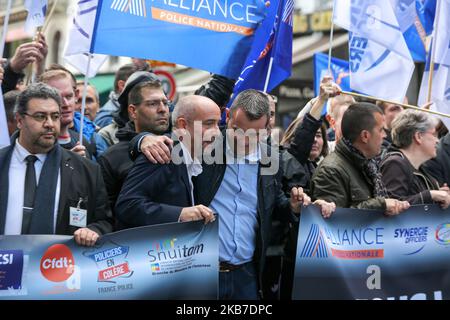 Yves Lefebvre (3L), general secretary of the Unite SGP-Police union, speaks with Fabien Vanhemelryck(4L), Secretary General of the Alliance-Police Nationale Union, during the ''Walk of Wrath'' of the Policemen in Paris on October 2, 2019. At the call of the National Police unions, several thousand police officers demonstrated in Place de la Bastille on 2 October 2019 in Paris. For the first time in 20 years, all unions have called for a 'March of Wrath' while 50 police officers have killed themselves since the beginning of the year. (Photo by Michel Stoupak/NurPhoto) Stock Photo