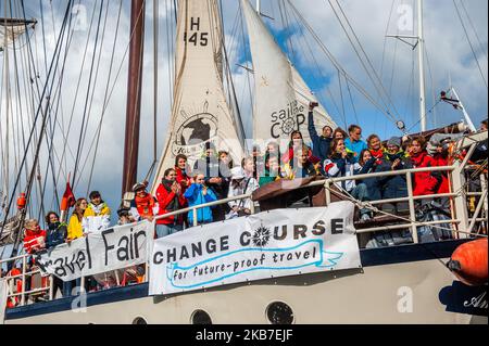 The whole group of climate activists are seen giving a speech to their relatives from the boat where they are going to be sailing to COP25 in Chile. Amsterdam, October 2nd, 2019. (Photo by Romy Arroyo Fernandez/NurPhoto) Stock Photo