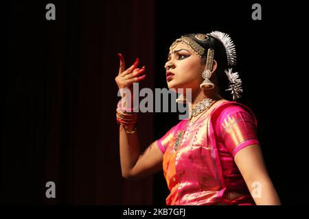 Tamil Bharatnatyam dancer performs an expressive dance during her Arangetram in Scarborough, Ontario, Canada. The Bharatnatyam Arangetram is the graduation ceremony where the dancer performs her first public solo stage performance after completing years of rigorous training. (Photo by Creative Touch Imaging Ltd./NurPhoto) Stock Photo