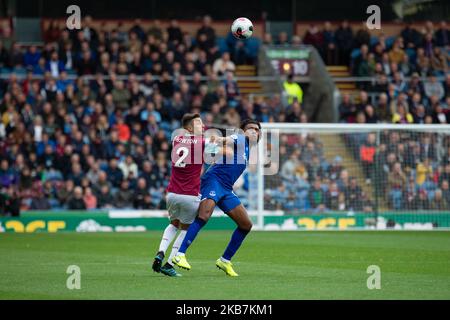 Alex Iwobi of Everton battles with Matthew Lowton of Burnley during the Premier League match between Burnley and Everton at Turf Moor, Burnley on Saturday 5th October 2019. (Credit: Pat Scaasi | MI News) Photograph may only be used for newspaper and/or magazine editorial purposes, license required for commercial use (Photo by MI News/NurPhoto) Stock Photo