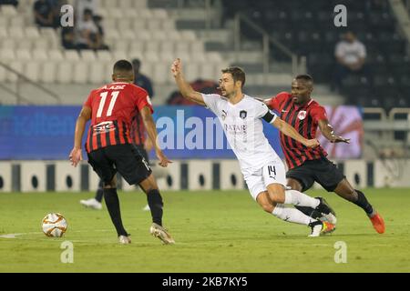 Gabi and Franck Kom fight for the ball during Qatar Stars League match between Al Sadd and Al Rayyan on October 5 2019 at the Jassim Bin Hamad stadium in Doha, Qatar. Final result: Al Sadd 2-4 Al Rayyan (Photo by Simon Holmes/NurPhoto) Stock Photo