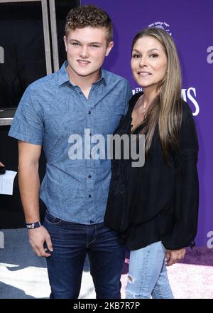 CENTURY CITY, LOS ANGELES, CALIFORNIA, USA - OCTOBER 06: David Vincent Turco and Paige Turco arrive at the World Premiere Of MGM's 'The Addams Family' held at the Westfield Century City AMC on October 6, 2019 in Century City, Los Angeles, California, United States. (Photo by Xavier Collin/Image Press Agency/NurPhoto) Stock Photo