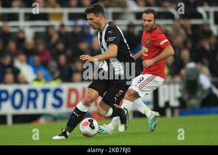 Fabian Schar of Newcastle United in action with Juan Mata of Manchester United during the Premier League match between Newcastle United and Manchester United at St. James's Park, Newcastle on Sunday 6th October 2019. (Photo by Mark Fletcher/MI News/NurPhoto) Stock Photo