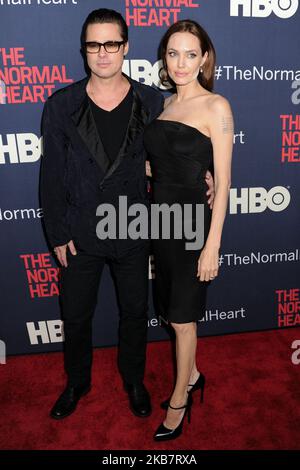 (FILE) Angelina Jolie talks Brad Pitt divorce: 'I felt a deep and genuine sadness'. MANHATTAN, NEW YORK CITY, NEW YORK, USA - MAY 12: Actors Brad Pitt (wearing Greg Lauren) and Angelina Jolie Pitt (wearing Saint Laurent dress and shoes) arrive at the New York Premiere of HBO's 'The Normal Heart' held at the Ziegfeld Theater on May 12, 2014 in Manhattan, New York City, New York, United States. (Photo by Image Press Agency/NurPhoto) Stock Photo