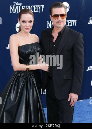 (FILE) Angelina Jolie talks Brad Pitt divorce: 'I felt a deep and genuine sadness'. HOLLYWOOD, LOS ANGELES, CALIFORNIA, USA - MAY 28: Actors Angelina Jolie Pitt (wearing Atelier Versace) and Brad Pitt (wearing Gucci) arrive at the World Premiere of Disney's 'Maleficent' held at the El Capitan Theatre on May 28, 2014 in Hollywood, Los Angeles, California, United States. (Photo by Xavier Collin/Image Press Agency/NurPhoto) Stock Photo