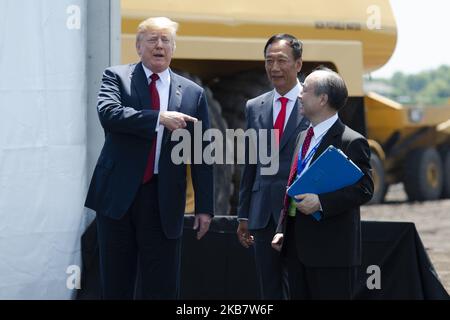 U.S. President Donald Trump, Softbank CEO Masayoshi Son and Foxconn Chairman Terry Gou attend the groundbreaking ceremony of Foxconn flat-screen TV factory in Mount Pleasant, Wisconsin, United States on June 28, 2018. (Photo by Yichuan Cao/NurPhoto) Stock Photo